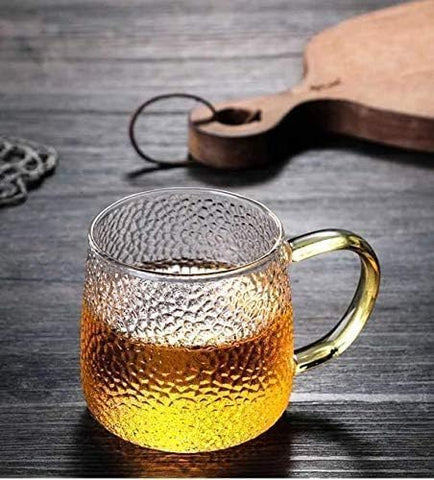 كوب قهوة زجاجي بمقبض ذهبي